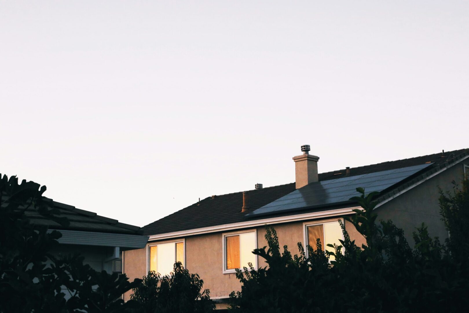 A house with solar panels on the roof.