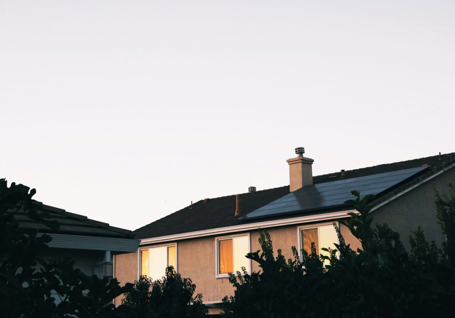 A house with solar panels on the roof.